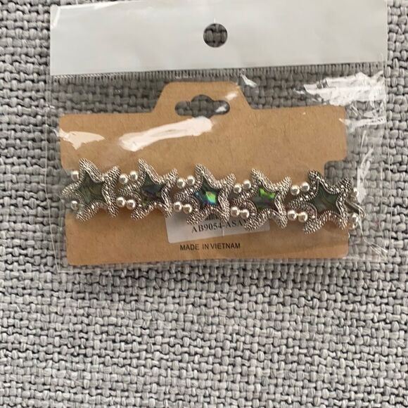 ‎Icon Stretchy Starfish Silver Iridescent Bracelet - Picture 1 of 2